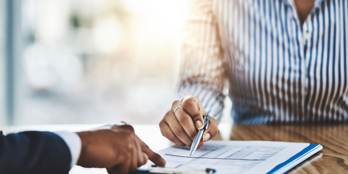 Man and woman reviewing contract